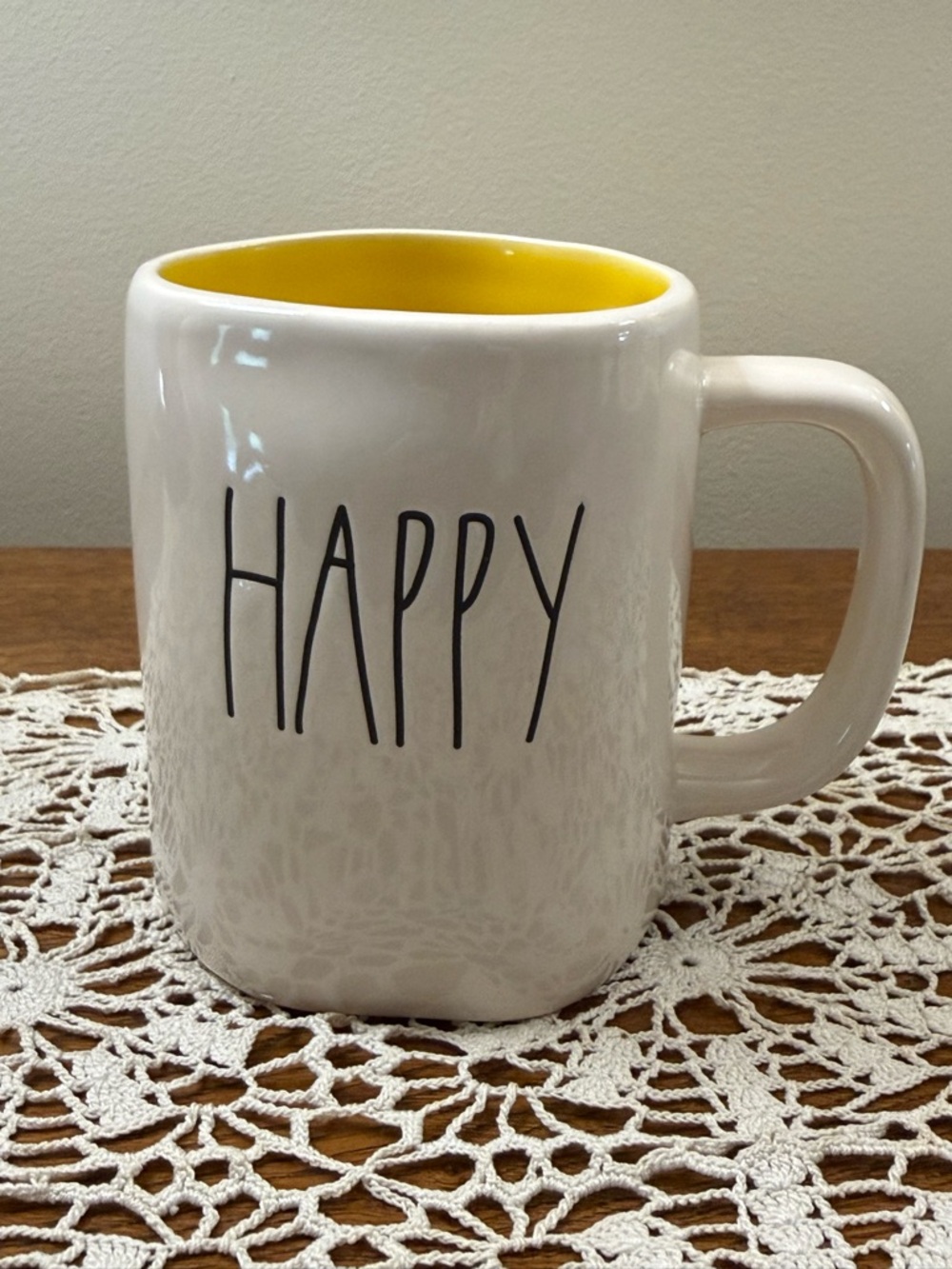 Rae Dunn “Happy” Mug, white w/yellow inside.  Like new!